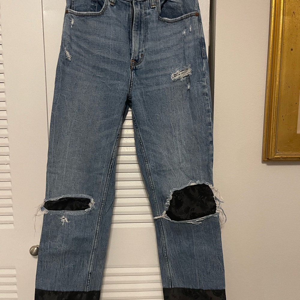 Distressed Blue Jeans with Black Accents